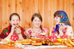 Women in traditional clothes celebrating Shrovetide